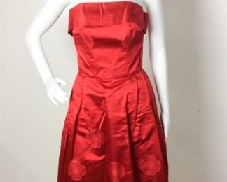Lot	109	Vintage Custom Creation China Red Satin Dress	Vintage Custom Creation China Red Sleeve-Less Satin D Pleated Front Dress ***NO SIZING *** Measures Approx. Women's 8
