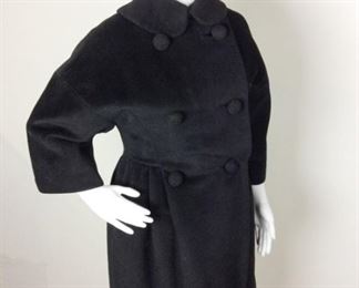 Lot	113	Vintage Cashmere Bergdorf Goodman Jacket	Vintage Black Cashmere Bergdorf Goodman Jacket Bergdorf Goodman @ The Plaza New York Six Crochet Covered Buttons - 3/4 Sleeve. Broken seams in sleeves and back lining. ***NO SIZING *** ( educated guess women's 8)
