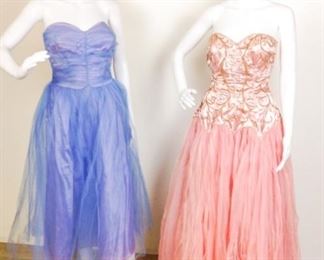 Lot	118	Two Vintage Custom Performance Dress	2 Vintage Custom Designed Performance Dress * Periwinkle Blue - Strapless - Satin & Tulle - ( bodice stain front) * Pink Rose - Heavily Embroidered over Satin Bodice - Layered Tulle Skirt (color aging to tulle - stains top bodice edge) both dress measures approx. 25" bottom bodice end boning *****NO SIZING **** NO MARKER LABEL ***** educated measuring - small 6/8 size

