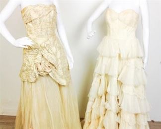Lot	119	Two Vintage Custom Performance Gowns	Two Vintage Custom Performance Gowns * Ivory Strap-Less - Tier Tulle - Single Accent Lace to each Tier ( dress has age wear - storage crush - tulle tearing * Long Bodied Strapless Bodice Gold Lame - Brocade -Flower Accent Skirting is Layered Tulle to Poof Bottom over Cream Lined Satin (dress has storage crush - bottom of skirting dirty from floor walking) ****NO SIZING **** No Marker Label **** ( both dresses measure approx. SMALL 6 / 8 )

