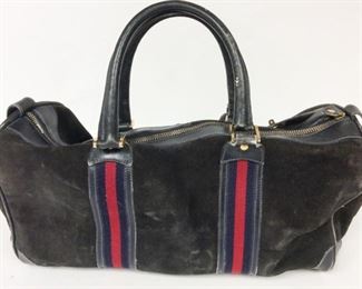 Lot	131	Gucci Suede / Leather Trim Keyed Duffel Bag	Gucci Black Suede - Blue/ Red Strip Leather Trim - wear to corner trim Locking with keys in original pouch Inner zipper Pocket - Blue Lined
