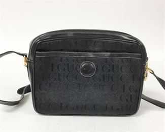 Lot	132	Black Gucci Handbag	Approximately 12"W x 9"H. Some wear

