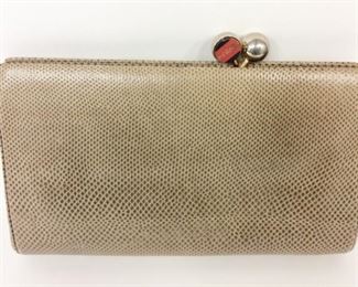 Lot	135	Judith Lieber Snake Skin Clutch	Judith Lieber Taupe Snakeskin Clutch Snap Ball Closure ( no strap ) Inner pocket & inner zipper pocket
