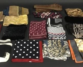 Lot	144	Lot of Mostly Designer Silk Scarves	Designer Silk Scarves Including Givenchy and Carolyne Roehm.
