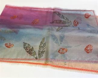 Lot	146	Designer - One Of A Kind - Hand Printed Scarf	Designer - One Of A Kind - Hand Printed Scarf Golden Paint on Silken Organza Measures - 21 wide by 72 long
