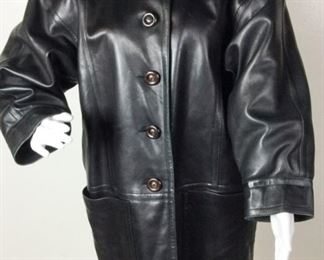Lot	150	Saint Laurent Black Leather Jacket	Saint Laurent ~ rive gauche Made in France Black Leather Jacket - quilted liner - Button Up Closure ** no sizing ** ( Approx. Large) The back of collar has crease marks when up. Arm 20" Chest 22" Back 33"
