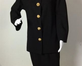 Lot	152	Golden Star Gianfranco Ferre - Skirt Suit	Golden Star Gianfranco Ferre SIZE 40 100% Wool Black Skirt Suit Five Golden Star Snap Closure Buttons
