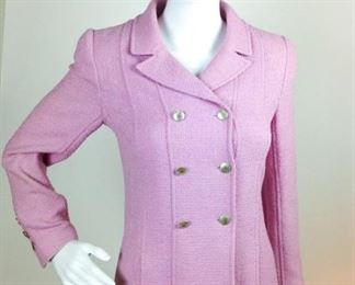 Lot	156	Vintage Chanel Boutique Lavender Jacket	Vintage Chanel Boutique - Made In France Lavender Double Breasted Wool Blend Jacket Six Channel Silver Tone Buttons Jacket Front Six Channel Silver Tone Buttons - Three each Cuff SIZE 34 -USA women's - size 4

