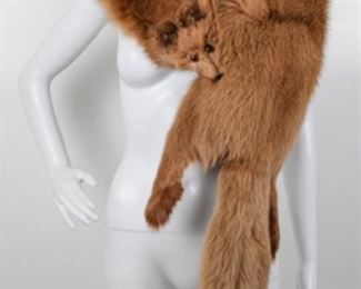 Lot	161	Vintage Full Bodied Red Fox Stole / Wrap	Vintage Full Bodied Red Fox Stole / Wrap Measure from nose tip to tail end 60" long Approx. 9" at widest -2 Knotted Crocheted Snap Fastener Face has marbled eyed - four paws The mouth is hinged clip also
