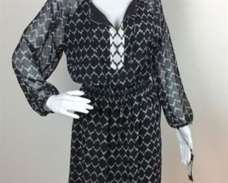 Lot	177	Ivanka Trump Dress Black & White NEW w /TAGS	Collectible Fashion - Ivanka Trump black & White Geometric Design Dress - Sheer Illusion Fabric overlay Solid Body Tie Neck - Golden Tie Ends SIZE 8
