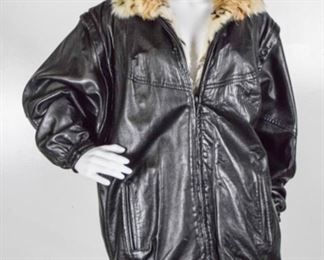 Lot	186	Leather and Lynx Jacket	Leather and Lynx Reversible Jacket does not have any tags or sizing but fits like a size Large. No visible marks or damage.
