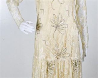 Lot	193	Tamara Boutique - New York 100% Silk Dress	Tamara Boutique - New York 100% Beige Long Sleeved Silk Dress Lace Over- Lay Embellished in baby Pearls - Flute Beads Opalescent Sequins - Lined - Six Covered Button Back Closure SIZE 10
