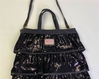 Lot	200	Red Valentino Black Leather and Sequin Tiered Tote	Authentic Red Valentino black leather and sequins, double handled large bag with pouch. magnetic snap closure, Lightly used Condition - Some staining on bottom Dimensions - 17" l x 15.25" h x 1.5" w
