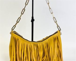 Lot	225	Yellow Carolina Herrera Fringe Leather Bag	Mustard color Carolina Herrera leather bag. Made in Spain. Tan fabric lining with zippered pocket. Leather and gold tone chain strap. Some Staining inside but in very good condition 13" l x 11" w x 5.5" d
