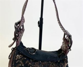 Lot	236	Lupo Yellow Abanico Leather Bag	Made in Spain, double handles hobo bag with fabric lining, one zipper pocket with embossed Lupo logo. Pen marks on side of bag, on handle and interior. 17.5" l x 17.5" w x 3.5" d
