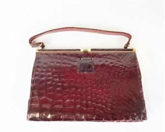 Lot	243	Mark Cross Red Alligator Handbag	Some wear. 11 3/4"L x 8"H
