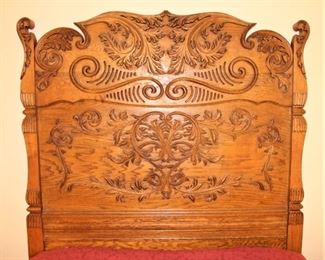 Close-up of antique carved headboard.  