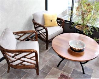 We have four matching rattan style chairs and a wrought iron base round coffee table.  