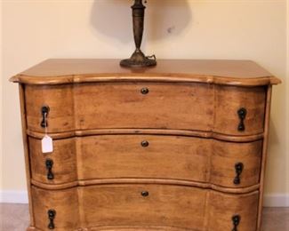 Beautiful chest shown with antique slag glass lamp.  