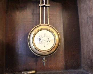 Pendulum of clock.  