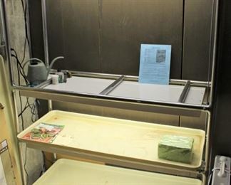 Flora cart.  Three shelf lighted plant growing station.  