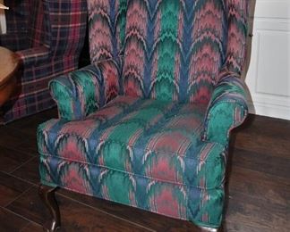 One of two matching wingback chairs