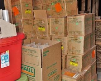 Boxes full of candles and holders