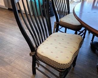Lot 5500 $1,200.00. 60" Round Nichols & Stone Dining Table With One 18" Leaf, 6 Chairs & Cute Cushions, Chairs are black in color, as is the base of the table, the tabletop is a warm cherry. This fabulous table could be great for the kitchen eating area or dining room. Normal usage wear on the tabletop. This one won't last!