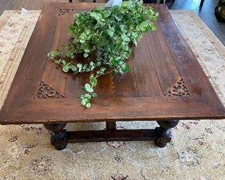 Lot 5504. $200.00. Massive Hardwood Coffee Table, with Turned Legs, Carving at the corners, plenty of style, intentionally distressed. Fits in with a farmhouse style. 43"w x 55"l x20"h. Heavy. Great table for a home with kids. Other items in this picture are available in upcoming lots.