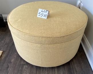 Lot 5510 $225.00. 33' Diam. Super Nice Round Yellow/tan Ottoman with Great Storage (Blankets, Magazines, Remote Controls...). Made for Jonathon Lewis. Microfiber Lined Storage and Casters. Very Heavy Piece.