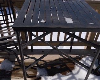 Lot 5516. $85.00. Outdoor Bistro Table and Two Swivel Chairs. The tabletop needs to be scraped and spray painted, the two chairs are in good shape, they come with two turquoise chair pads. Bistro table height.