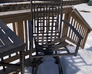 Lot 5516. $85.00. Outdoor Bistro Table and Two Swivel Chairs. The tabletop needs to be scraped and spray painted, the two chairs are in good shape, they come with two turquoise chair pads. Bistro table height.