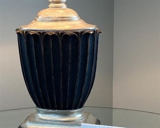 Lot 5550. $40.00. Cute table lamp with fabric shade; the lamp is black with platinum accents. 23" t on a 7" x 5" base; the lampshade is 11" in diameter.