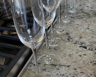 Lot 5524. $18.00. 6 sleek champagne flutes (1 has a chip on the base).