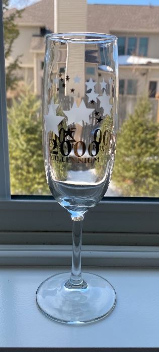 Lot 5526. $12.00. Set of 6 Millennium champagne flutes in 2 different designs.