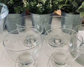 Lot 5539. $52.00 This lot includes a set of 4 glass pedestal dessert dishes/bowls and a Badash Coyle etched crystal bowl (5.5" in diameter). Keep an eye out for the potted greenery later in the sale.