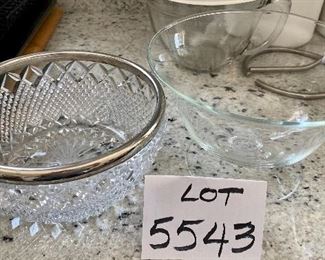 Lot 5543. $25.00 1) 8.5" Glass crystal bowl and 2) 8" Silver rimmed cut crystal serving bowl.