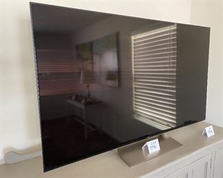 Lot 5581. Was $995.00 Today is $600.00 Firm. Sony 65" Android TV & Alexa, XBR-65X930E, w/ remote. Model yr. 2017. 4K (3840 x 2160 Resolution); Inputs: 4 – HDMI, 2 - USB2.0, 1 – USB3.0, 1 – Component/Composite Hybrid, 1 – Composite, Voice Remote Control (RMF-TX200U), WiFi/Bluetooth, Works with Alexa, ChromeCast built-in Smart TV. Measures 57" W x 36" H x 12" D Base. Orig Retail Cost $2,900.00