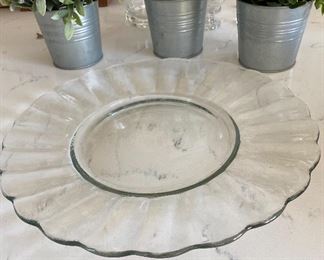 Lot 5547. $40.00 14" diam glass cake plate and a dome-covered pedestal cake plate (tiny chip on edge of pedestal plate.)