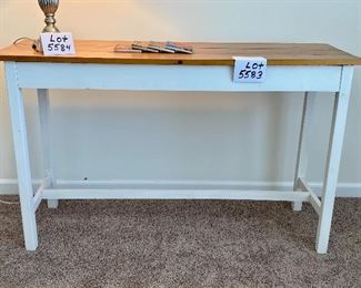 Lot 5583. $95.00 Rustic reproductions sofa table. Pinewood plank with white base and 4 posters. 48" L x 16" D x 29" H. We included 4 coasters by Detroit Coaster Co.