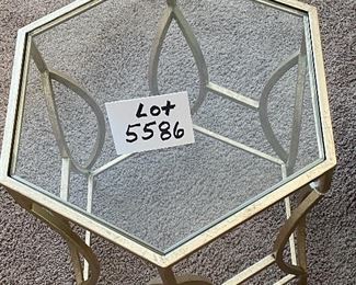 Lot 5586. $95.00 Goldtone metal tubular base with hexagon-shaped glass side table. Only one available.