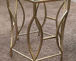 Lot 5586. $95.00 Goldtone metal tubular base with hexagon-shaped glass side table. Only one available.