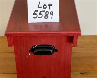 Lot 5589. $20.00. Red painted footstool with black metal handles.
