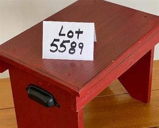 Lot 5589. $20.00. Red painted foot stool with black metal handles.