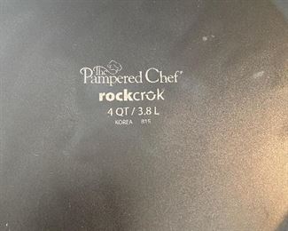 Lot 5554. $58.00 Pampered chef 'Rockcrok' 4Qt Dutch Oven. Retails for $140.00. "The Rockcrok® Dutch Oven is the perfect size for cooking for a crowd, and because it’s made from durable clay material, you can use it for any cooking method. It’s safe for the stovetop, broiler, oven, microwave, and grill. Plus, unlike other types of ceramic cookware, you can use Rockcroks right away without needing to preseason."