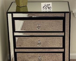 Lot 5590. $235.00. Matched pair of mirrored 3 drawer side chests. Chrome hardware includes an artificial plant as shown on top.