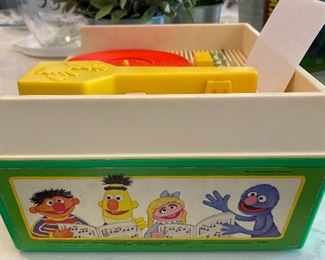 Lot 5573. $35.00. Fisher Price Sesame Street Music Box Record Player w./four records; works! 1984.