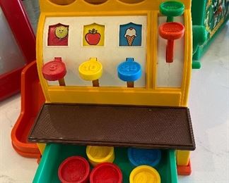 Lot 5574. $40.00. Ohio Art Magic Etch-A-Sketch, Fisher Price Cash Register w/5 coins, both collectible and in great shape