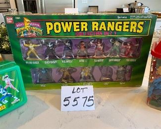 Lot 5575 $45.00. Container of mixed animals, dinosaurs, Indians and cowboys, Power Rangers Storage Box, and Power Rangers Collector Set One. May be missing a ranger or two.