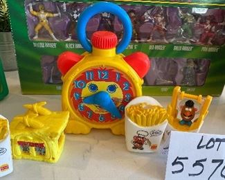 Lot 5576. $18.00. Playskool Stop N Go Wind-up Clock (works!), McDonald's Flintstones Meal Toy, "Roc Donald's Building Accessory c.1993, 2 Burger King French Fry Squirters, Burger King French Fry Jumper.